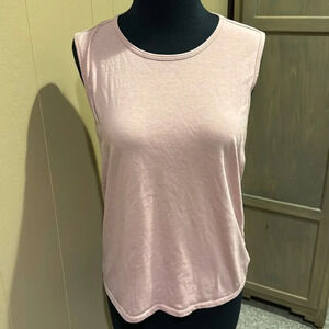 Fabletics light rose stretch muscle tank. V back with ladder neckline. Small.